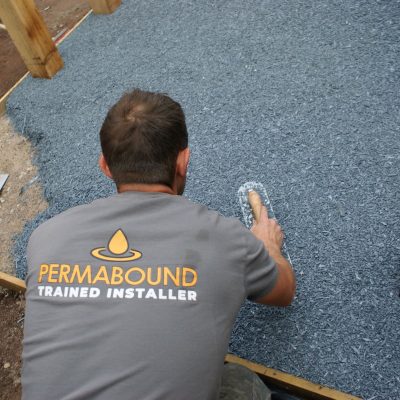 Troweling Cedar Grey Rubber Mulch