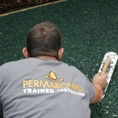 Troweling Moss Green Rubber Mulch